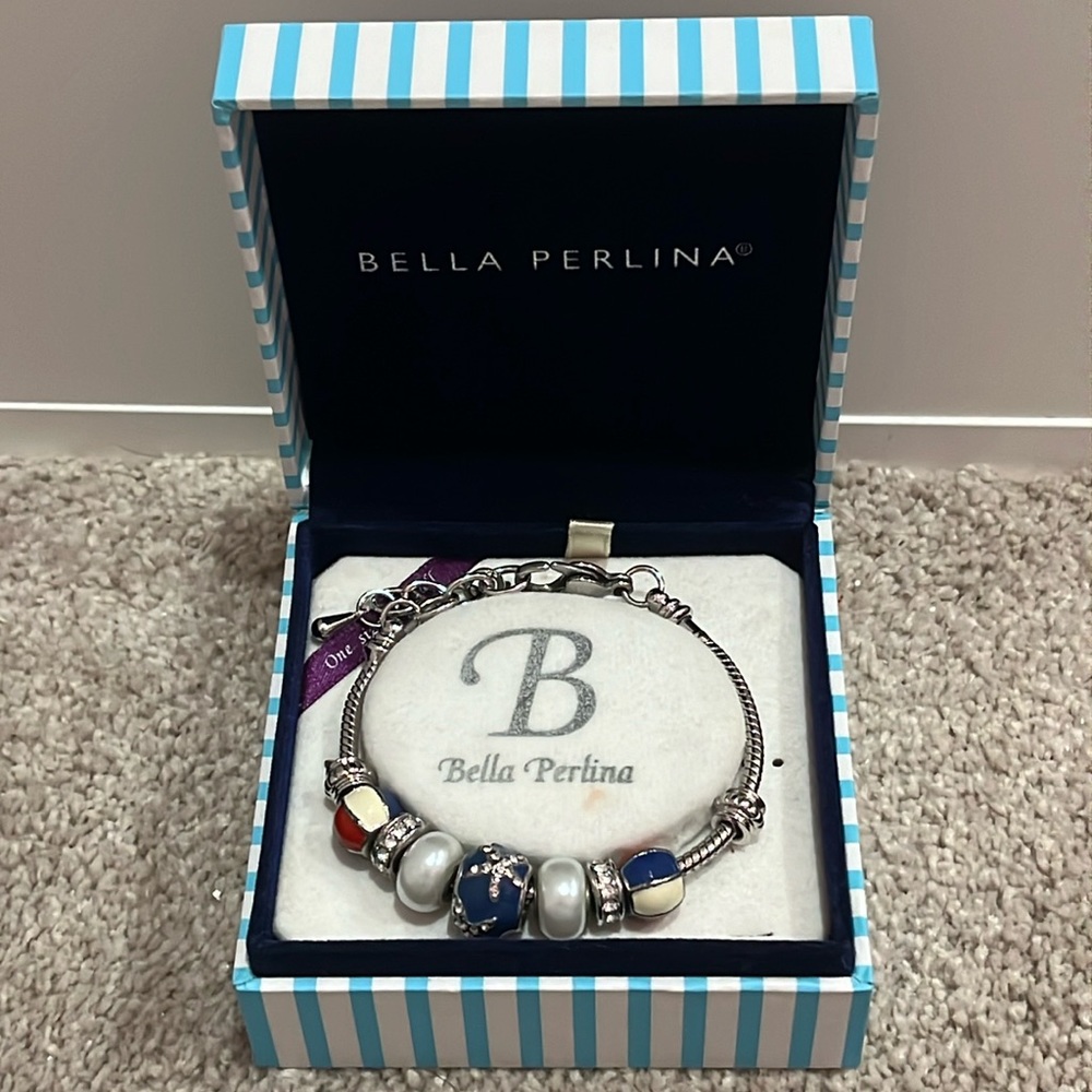 Never worn Bella Perlina charm bracelet